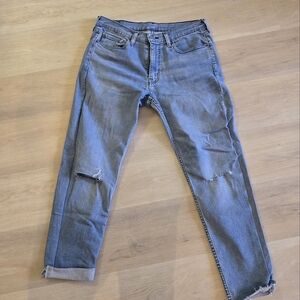 Levi's Light Blue Distressed jeans.